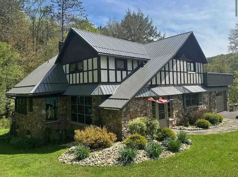 This Tudor style home is pretty! Circa 1920. Three acres in Pennsylvania. $265,000