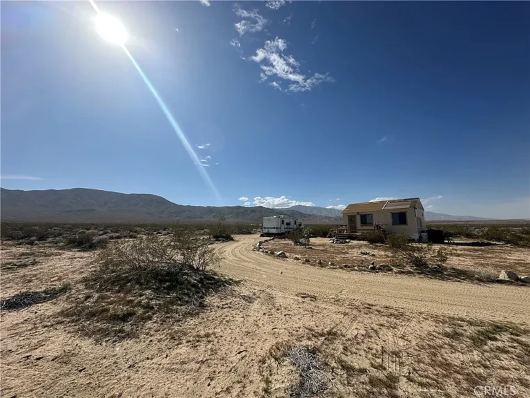 Off-Grid Desert Paradise on 2.5 Acres with Stunning Mountain Views
