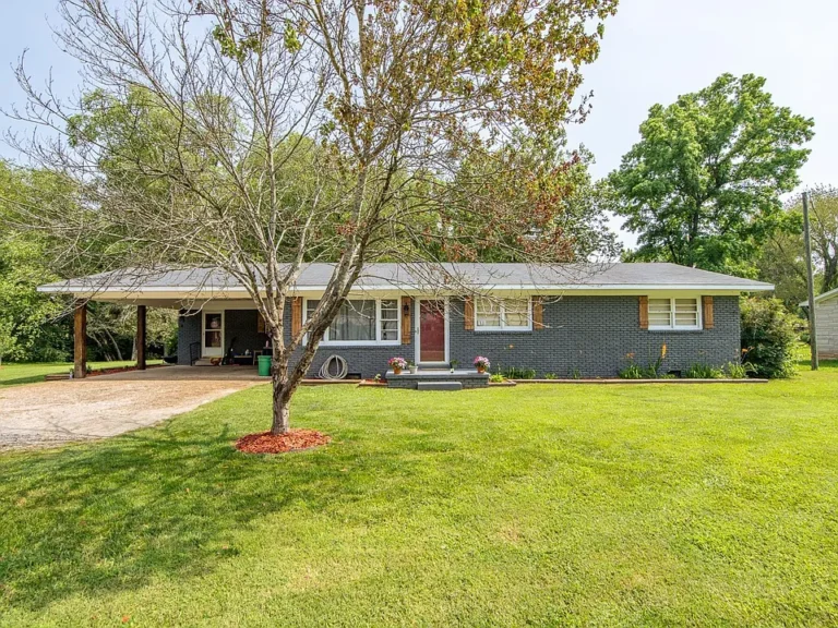 Updated Brick Home on 1.12 Acres with Shop, Creek Frontage & No City Taxes — Prime Waynesboro Location