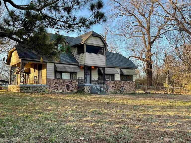 Spacious Country Home on 1.5 Rolling Acres with Endless Potential